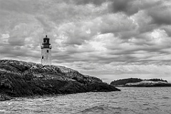 Moose Peak Lighthouse Over Rocky Islands in Maine -BW
